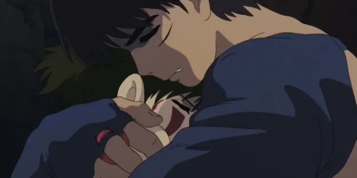 A Closeup Of Ashitaka Hugging San In Princess Mononoke 1