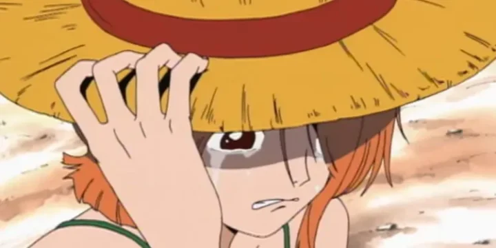 Nami From One Piece Wearing Luffy S Straw Hat And Crying